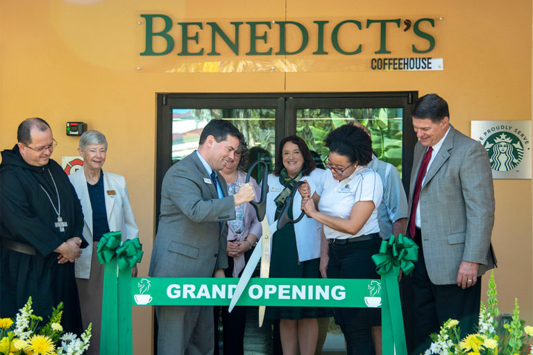 Ribbon cutting at the grand opening of Benedict's Coffeehouse