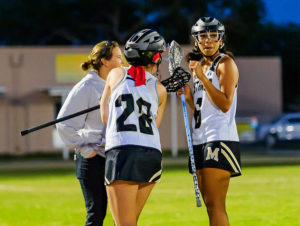 Linsey Hoskins and Mitchell players