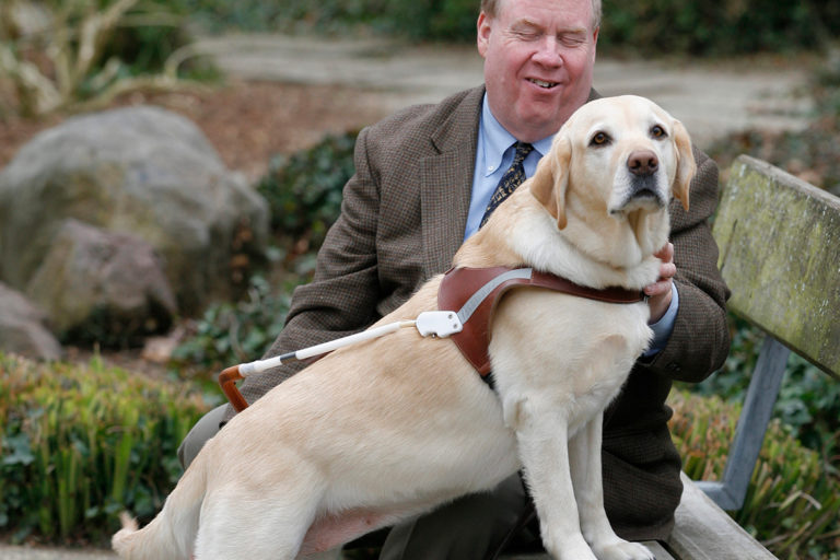 Michael Hingson with his former guide dog