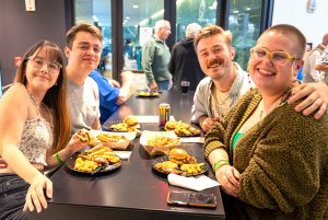 Young alumni group at Brews and Bites event.