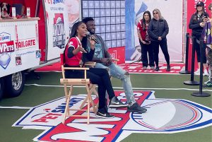 Christina Granville interviewing a Tampa Bay Bucs player.